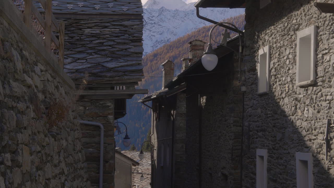 A view of a street with Superb and fascinating old houses in Courmayeur, Mont Blanc made by stone in the Aosta Valley, Itally.