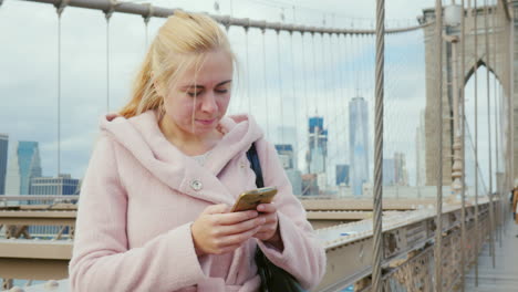 a young woman uses a smartphone 2