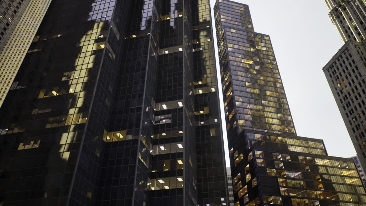 Modern urban skyscrapers reflect city life at twilight in a bustling area