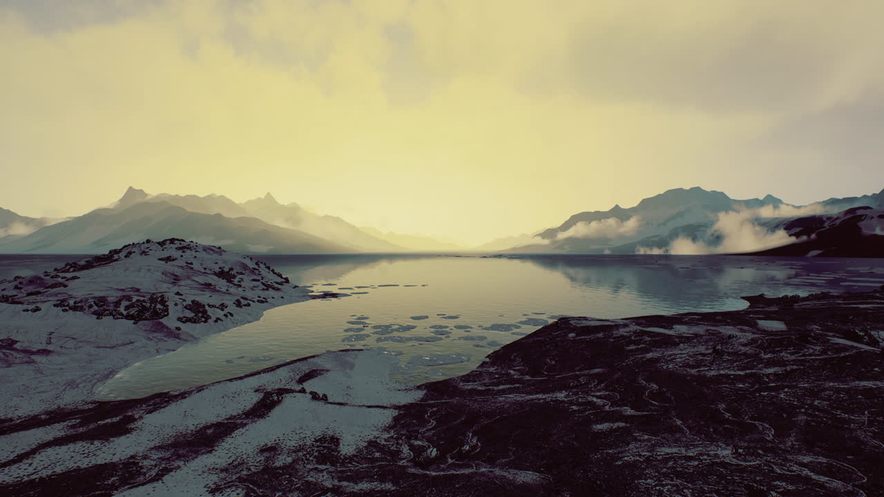 Majestic landscape with serene water and mountains at dusk