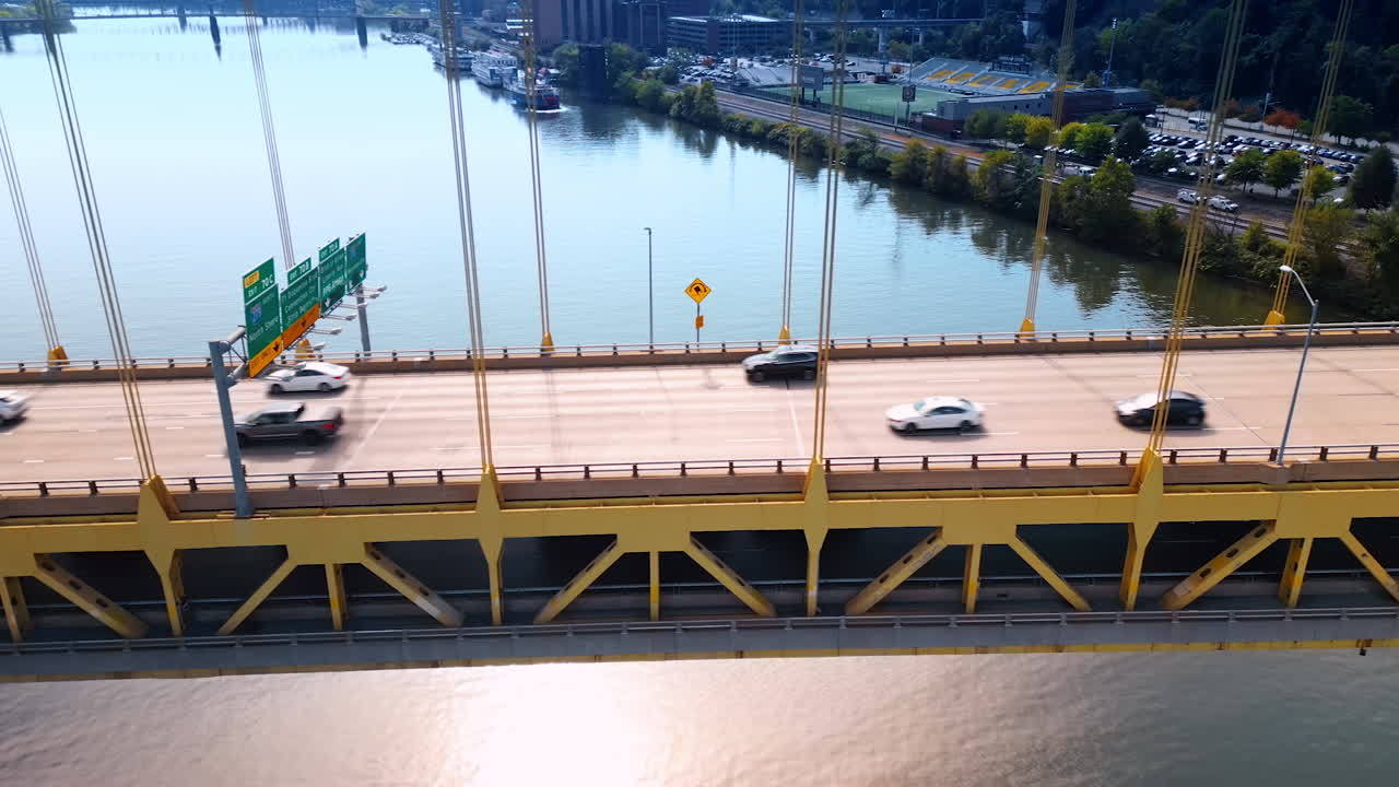 Piyysburgh, USA, 3 August 2025: Pittsburgh bridge over the river with cars. Close view of Pittsburgh bridge over the river with cars passing by