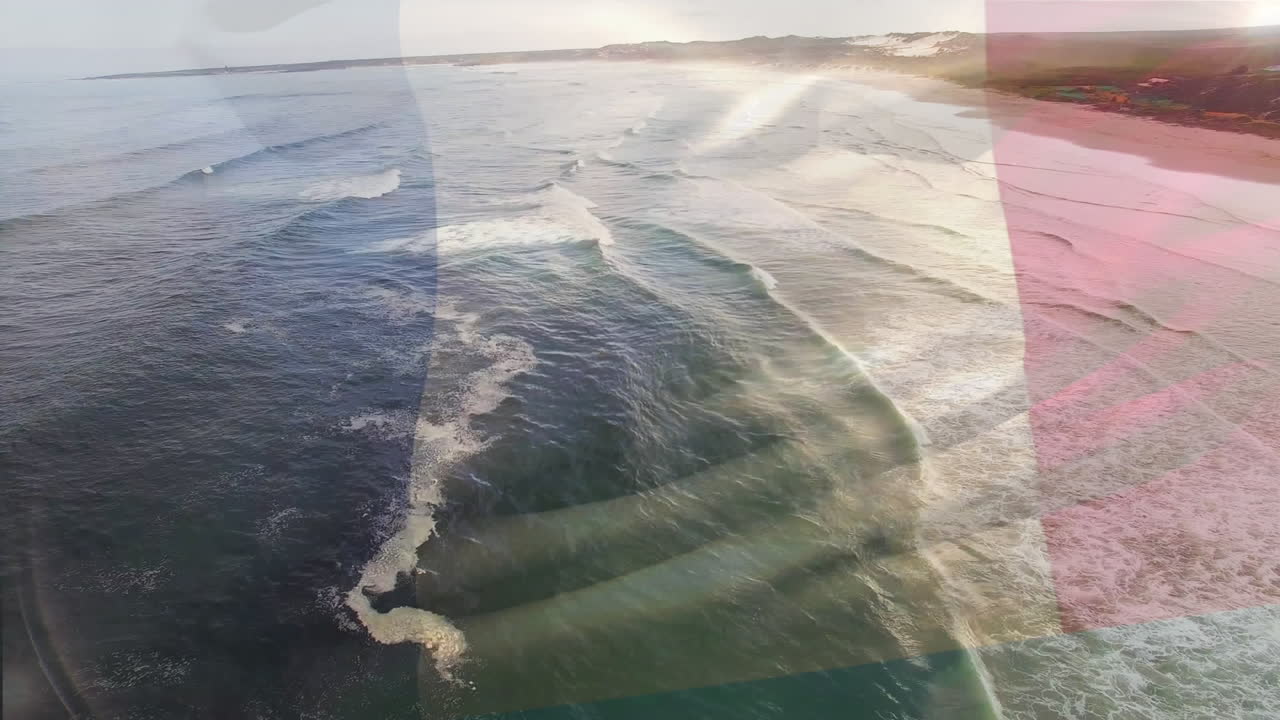 composición digital de agitar la bandera de francia contra la vista aérea de las olas en el mar