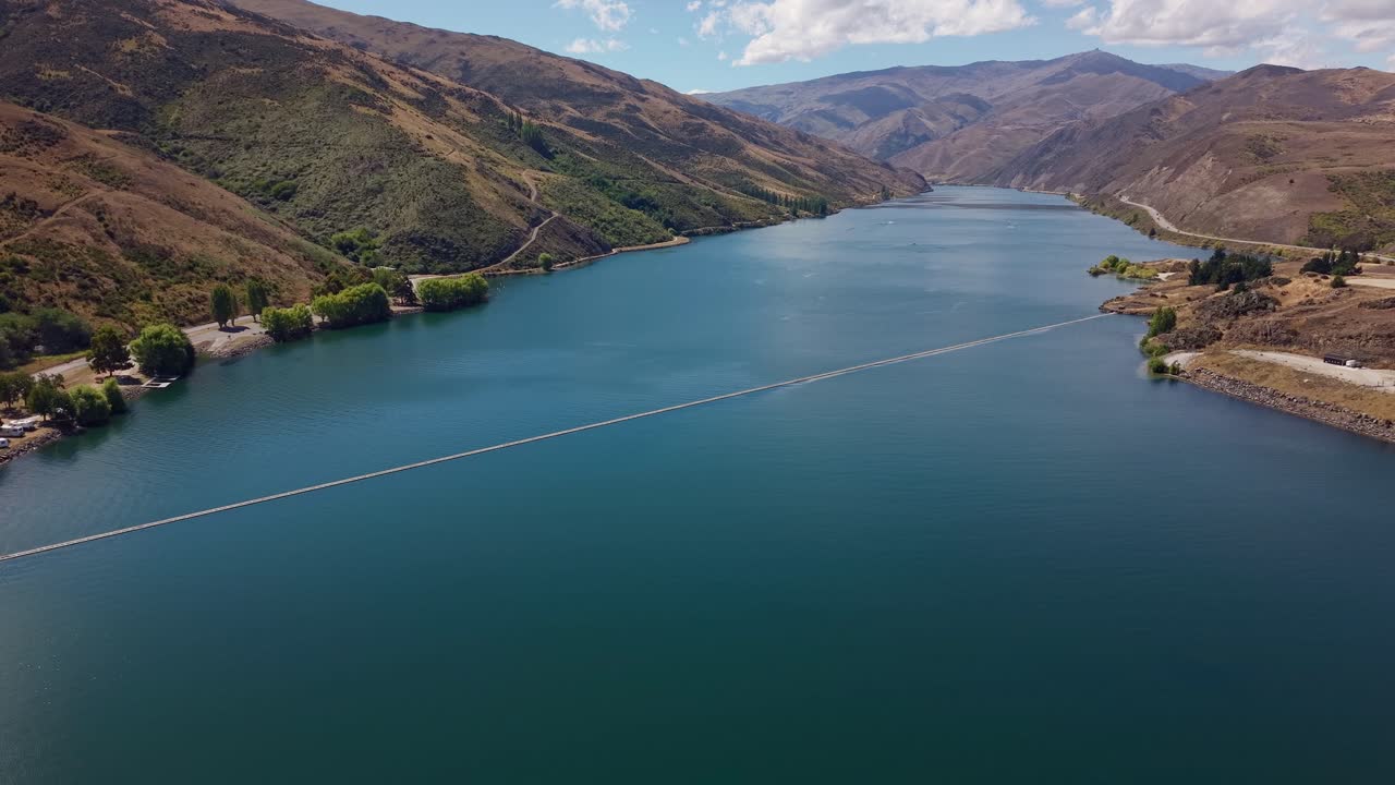 Clyde Dam, New Zealand with Lake Dunstan and scenic surroundings
