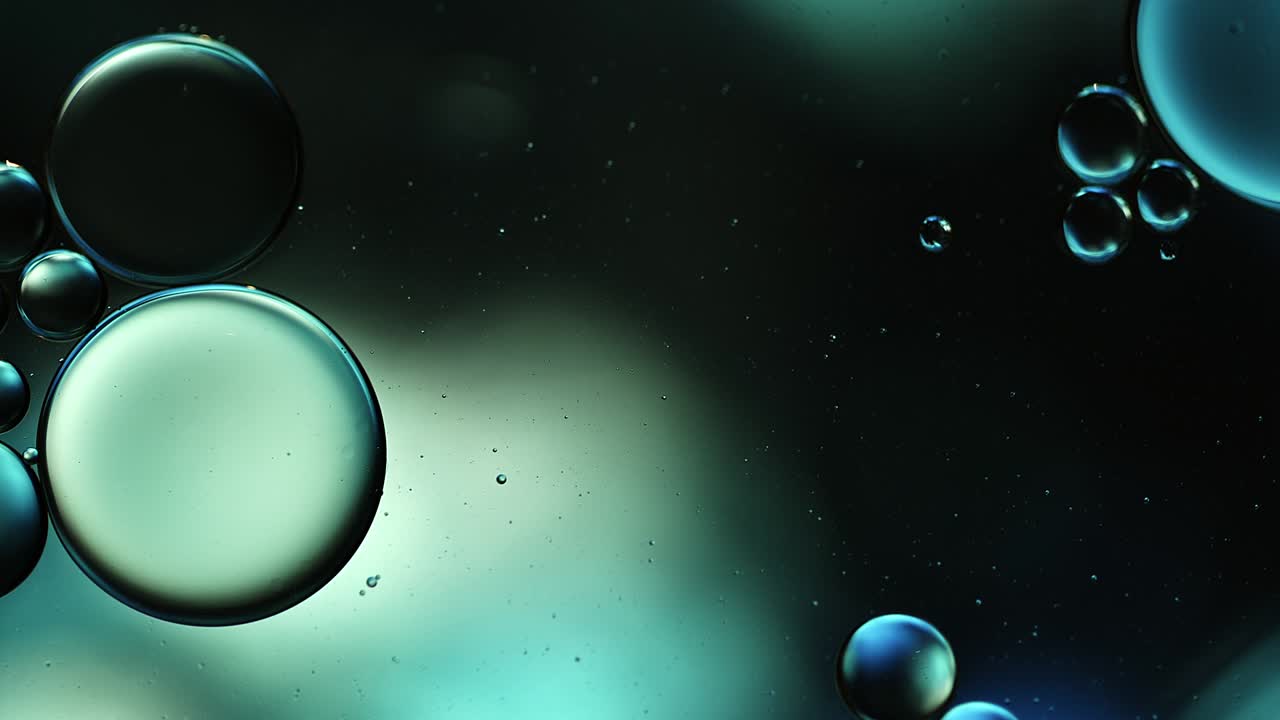 Abstract Colorful Food Oil Drops Bubbles and spheres Flowing