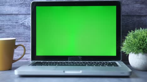 laptop with green screen mockup