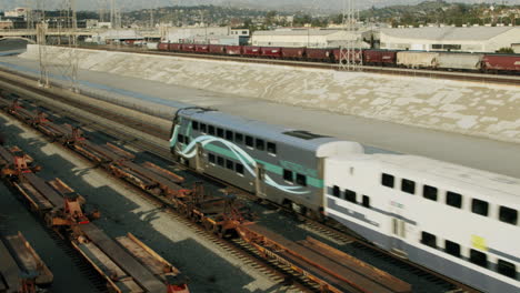 metrolink commuter train moving on tracks