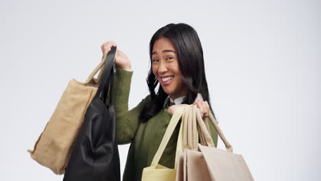 woman, dancing with shopping bag