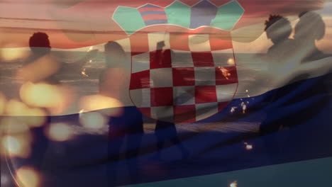 animation of waving croatia flag over group of friend on the beach