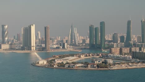bahrain skyscrapers and downtown manama, aerial view sunny day
