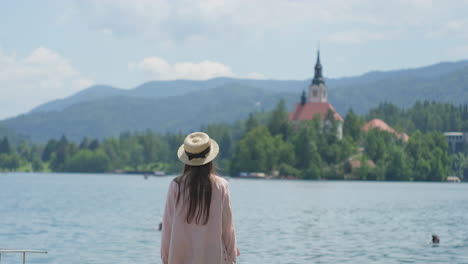 woman enjoying a scenic lake view