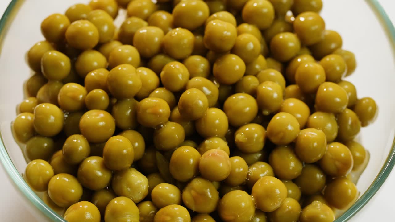 Canned Green Peas in a Glass Bowl