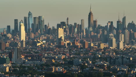aerial view of the new york city skyline at sunrise