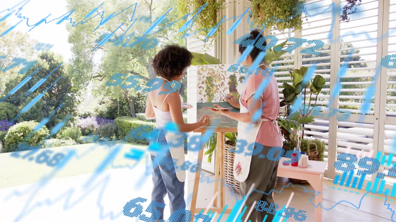 Mentor and student talking at easel guiding strokes to finish art while blue charts drifting