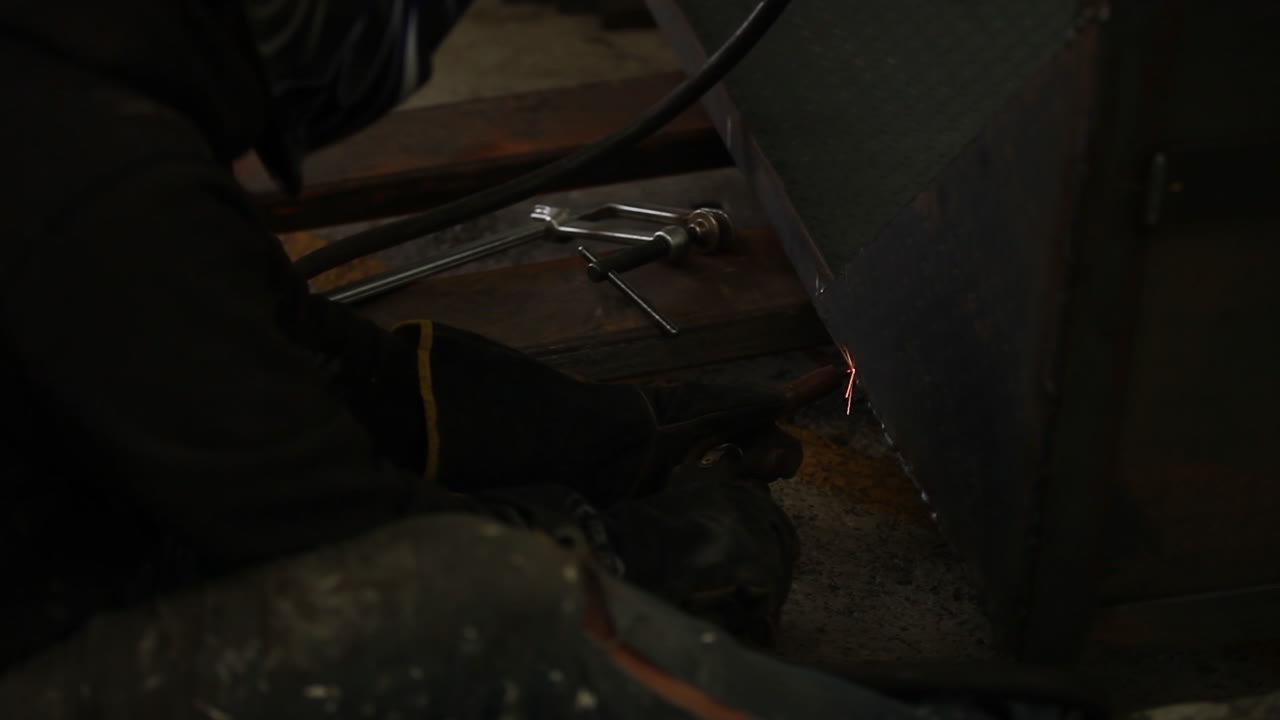 Metal clamp used to keep metal sheets together before becoming connect from welding arc melting them together