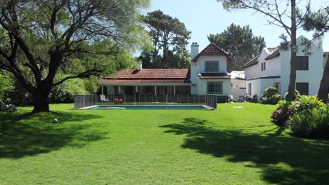beautiful home exterior establishing shot of house in sunny day