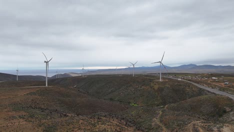 Wind-farm-on-the-side-of-the-road-in-the-Coquimbo-Region,-country-of-Chile