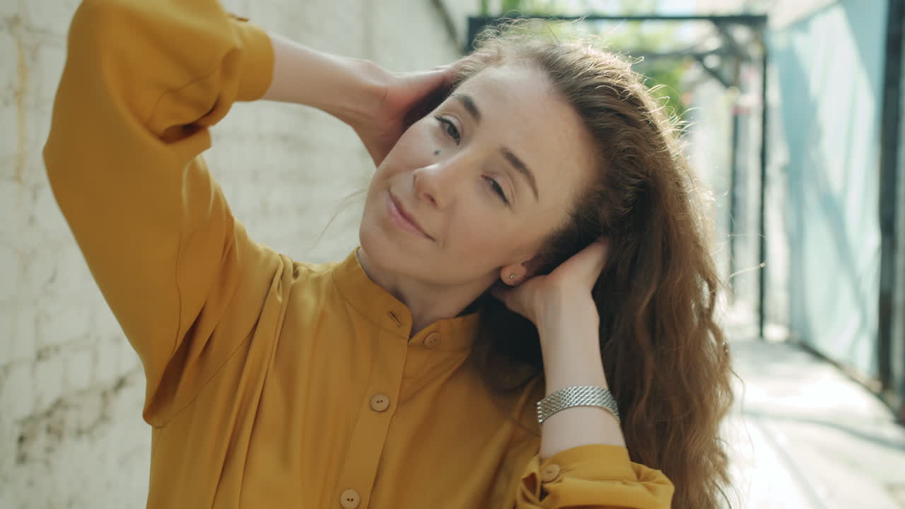 Young Woman with Long Curly Hair