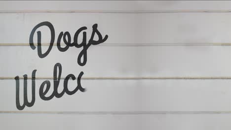 dogs welcome sign