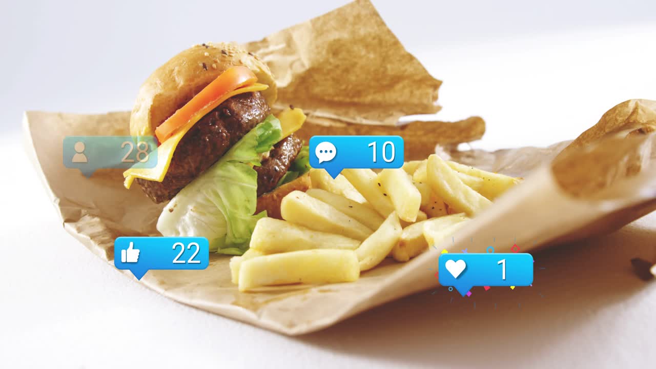 Blue reaction bubble appearing, wrapped burger and fries sliding in, reactions rising to show buzz