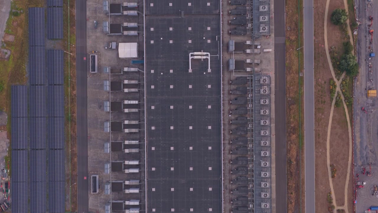 Aerial View of Industrial Data Center Facility with Solar Panels