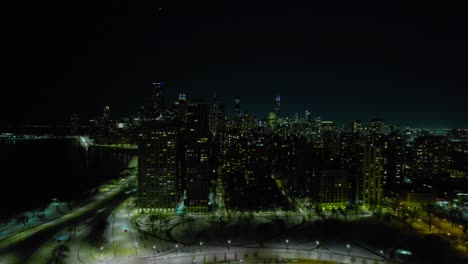 sliding night aerial of chicago city
