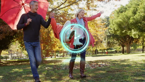 neon blue digital clock ticking against caucasian family playing in the park