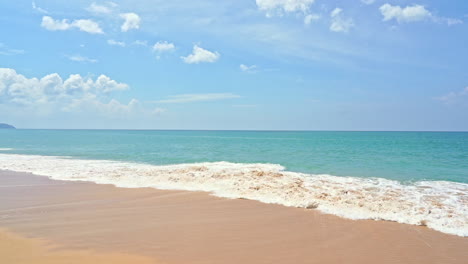 Waves-breaking-on-sandy-beach.-Slow-motion