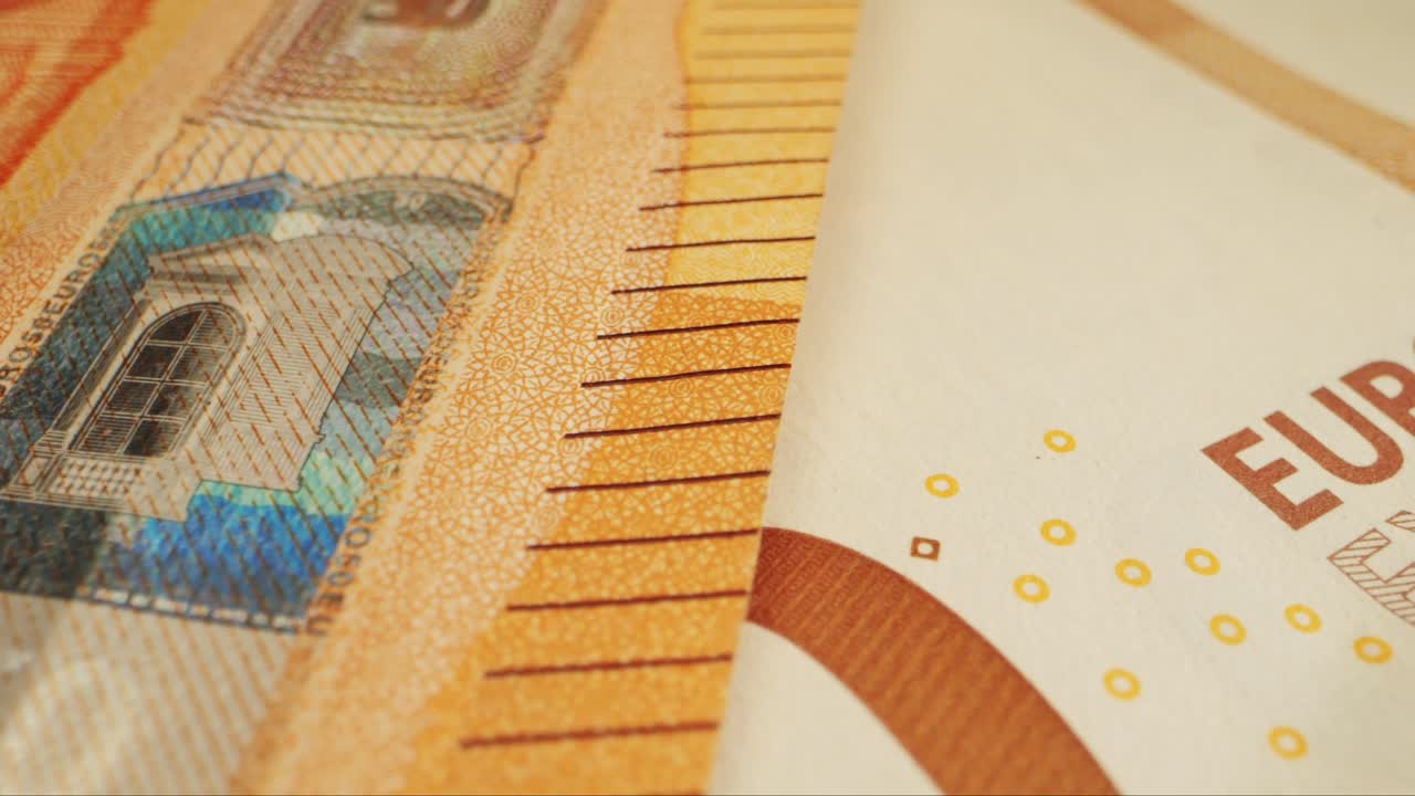 Fifty euro banknotes close-up. European currency EUR, EU Central Bank. 50 euro money macro. Economy, financial and banking concept in European union.