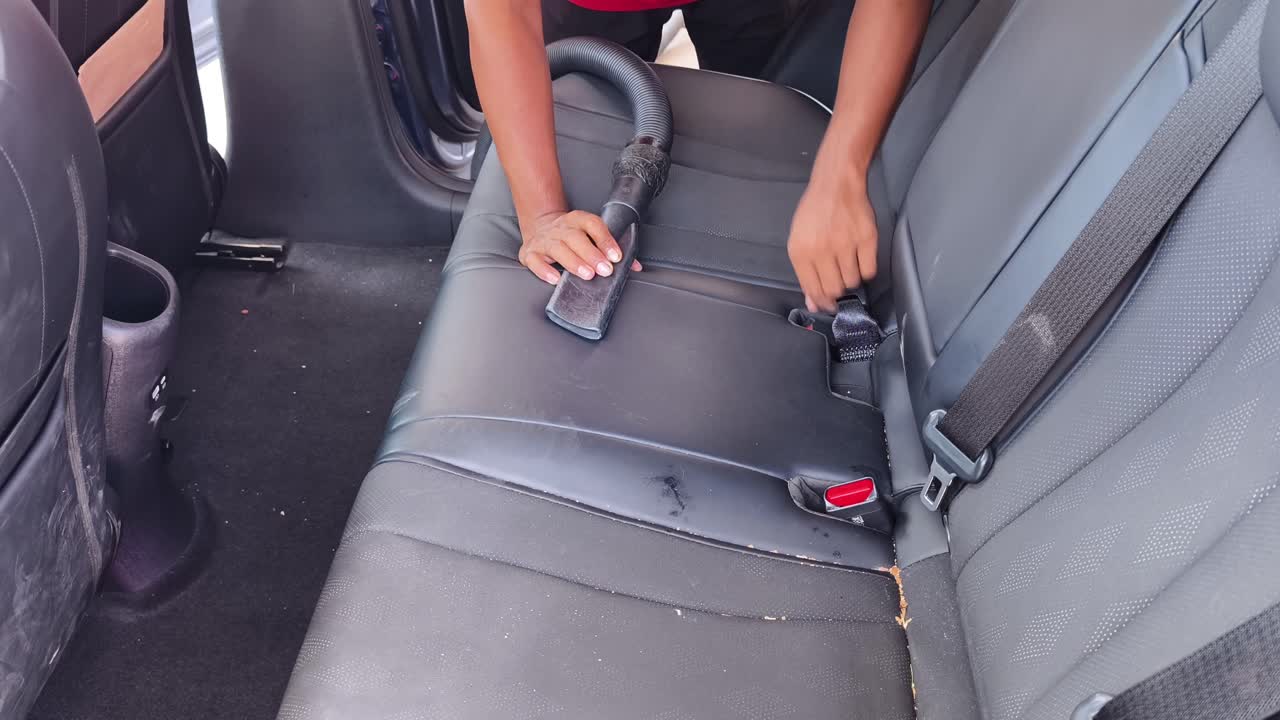 Vacuuming a Car Back Seat