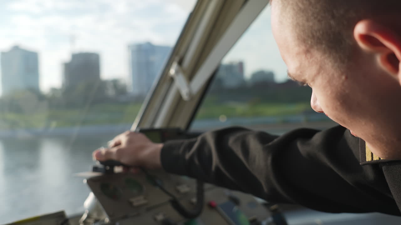 Man operating radio on a vessel
