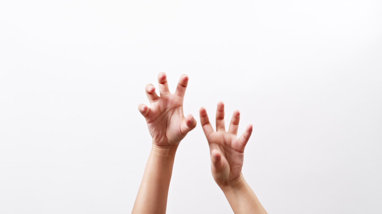 Close up of a woman's hand up and showing maul isolated on a white studio background with copy space for placing a text for an advertisement.