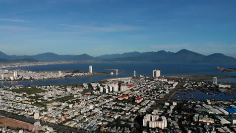 View-of-bay-and-city-of-Da-Nang-Vietnam,-aerial-panning-right