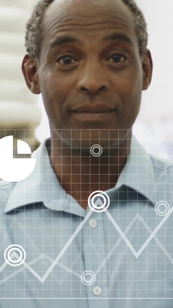 Vertical video: Cloud icon showing on man, starting zoom, revealing face as charts moving for biz