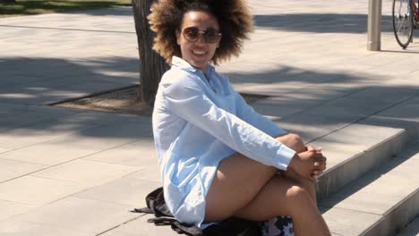 Charming-trendy-black-woman-on-street