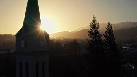 Sunlit-bell-tower-at-Krupówki-near-Zakopane,-Poland