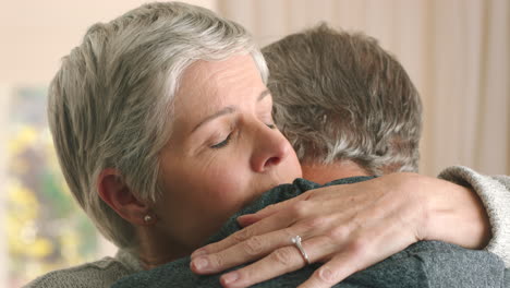 love, support and hug with a senior couple hugging