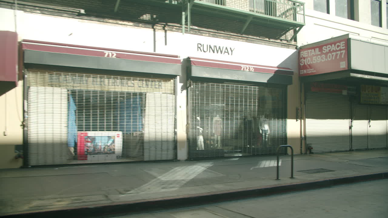 Closed Storefronts with Security Gates on an Urban Street
