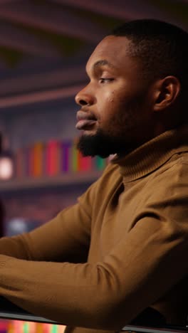 vertical video man in wheelchair working in inclusive ai tech agency