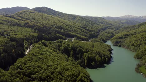 Lush-Green-Forests-And-Mountainous-Topography-Of-Prahova-County,-Romania---aerial-shot