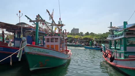 fishing vessels navigating a crowded waterway.