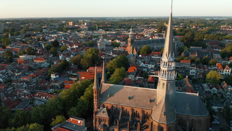 neo-gothic architecture of the church spire of gouwekerk in gouda city, netherlands