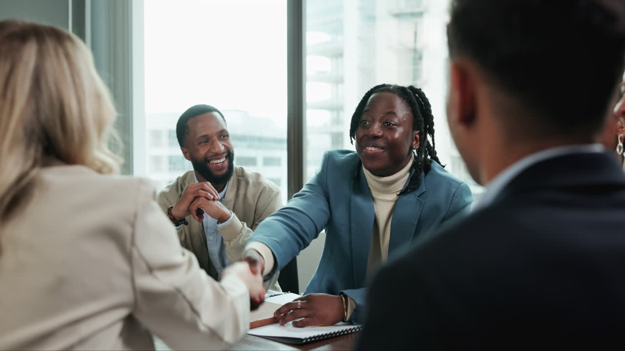 Business meeting with successful handshake