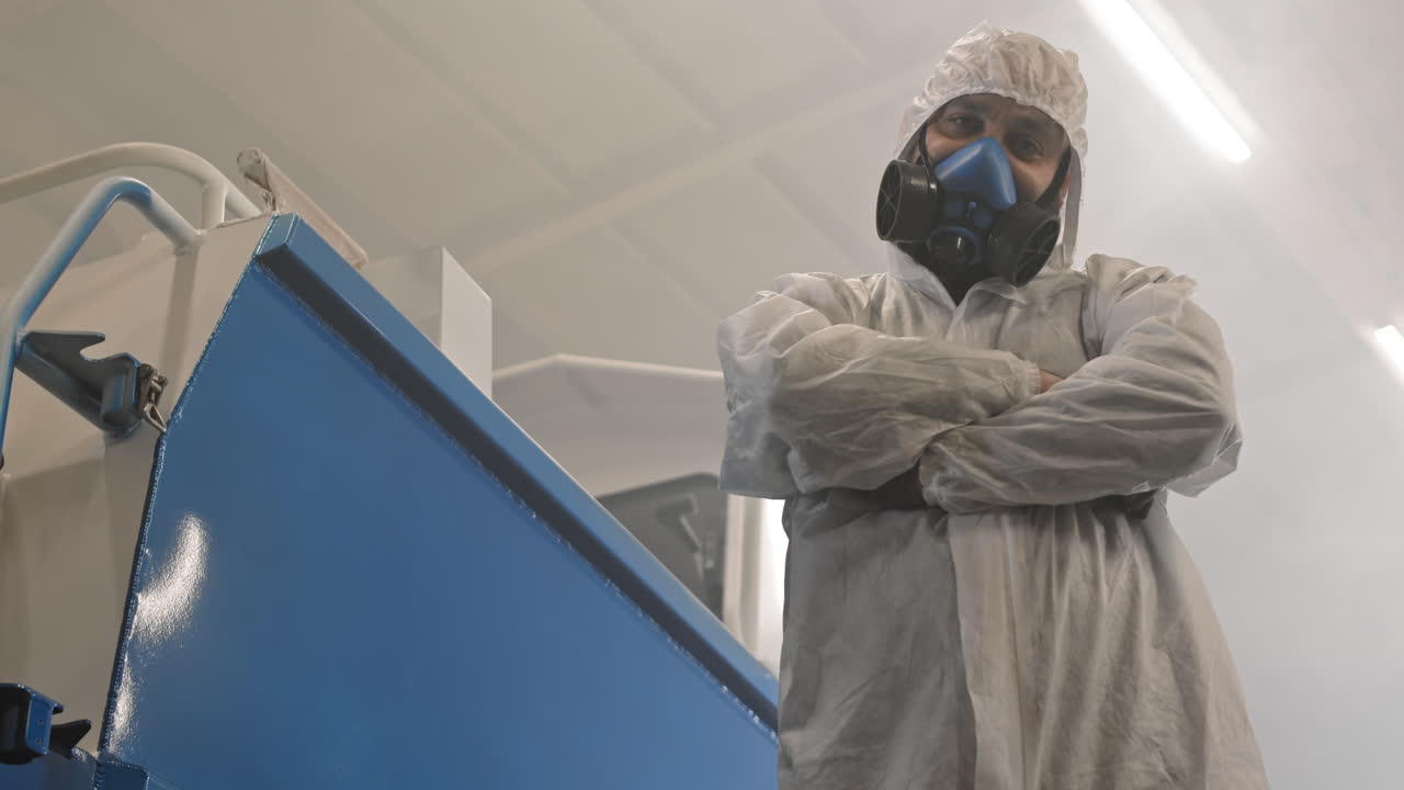 Man in Hazmat Suit with Respirator