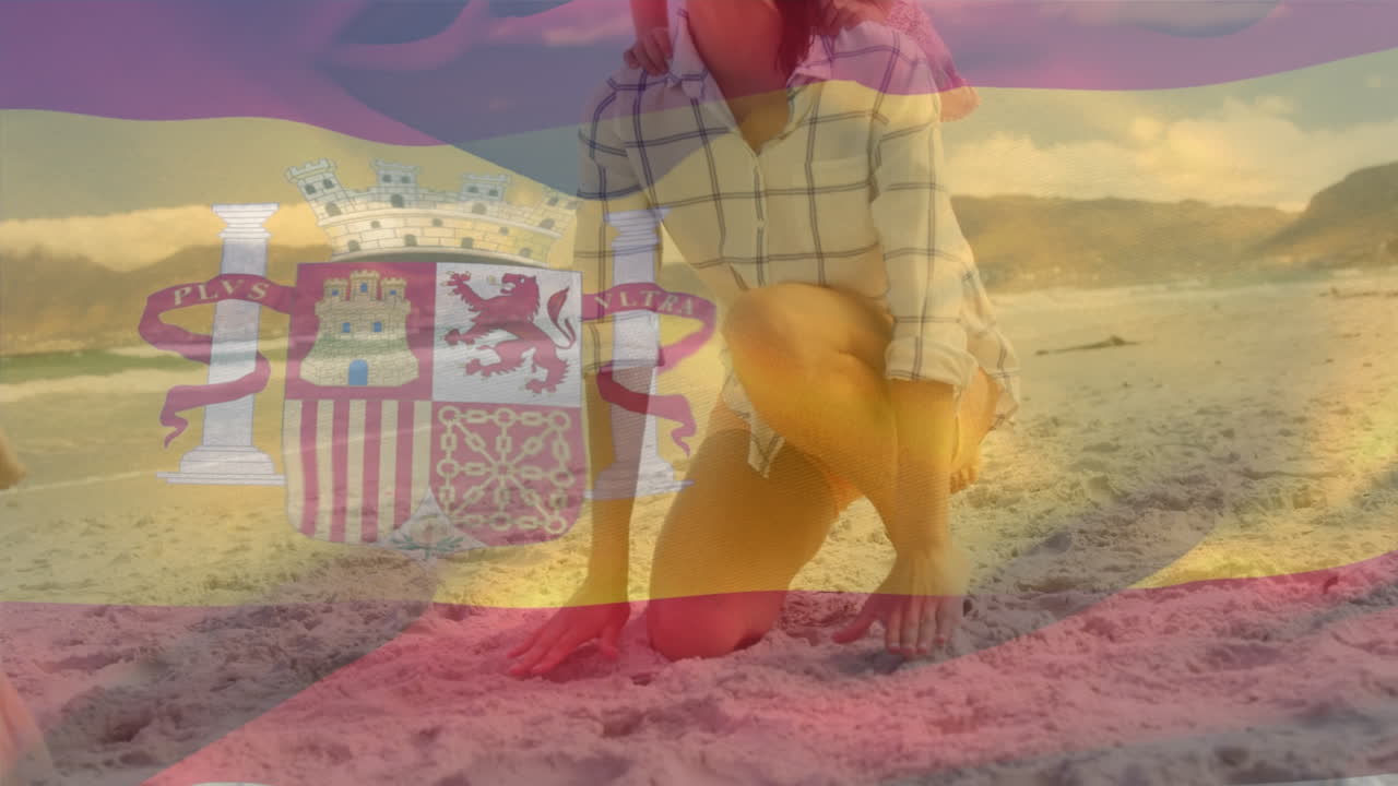 animación de la bandera de españa sobre una familia caucásica en la playa