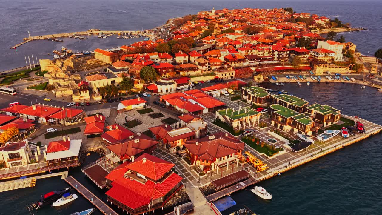 Aerial view of historic Nesebar with red rooftops and seaside charm