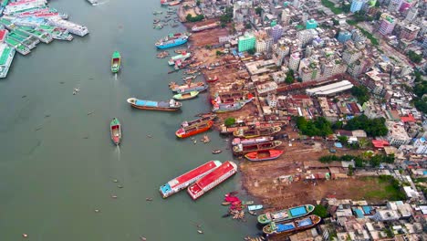 Aerial-view:-Buriganga-river-ship-repair-dockyard-in-Dhaka,-Bangladesh