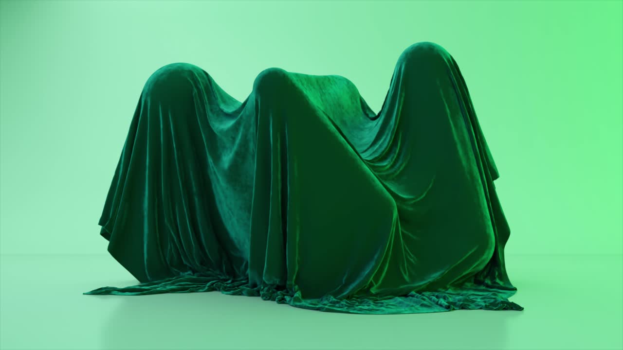 drapeado de terciopelo verde esmeralda sobre formas abstractas