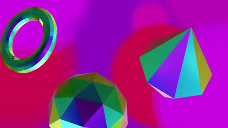 animación de formas 3d metálicas de colores reflectantes que giran sobre un fondo púrpura suave y rojo