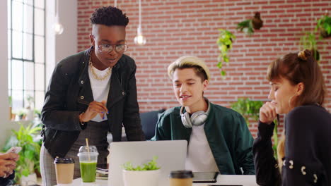 diverse team collaborating in modern office