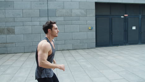 Sporty man running outdoor